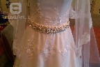 Balta neriniuota vestuvine suknele