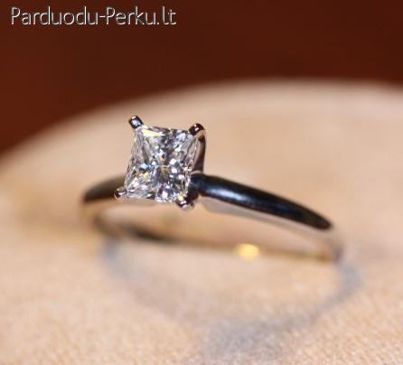 Balto aukso žiedas su 0,71ct bespalviu briliantu