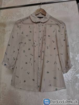 Daili šviesi palaidinukė