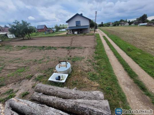 Du sklypai, vienas šalia kito