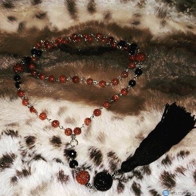 Kaklo papuošalas su kutu