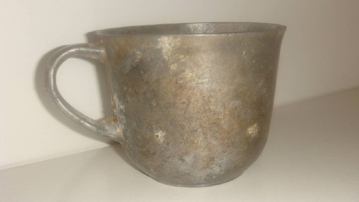 Karo laikų puodelis