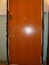 Parduodamos metalines buto durys su medine apdaila