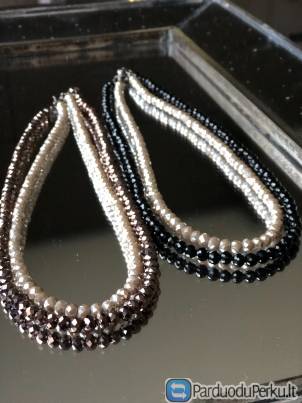 Puošnus karoliukų vėrinys