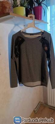 Puosnus megztinis moterims